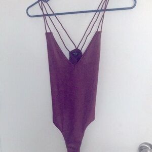 Size X-Small Body suit